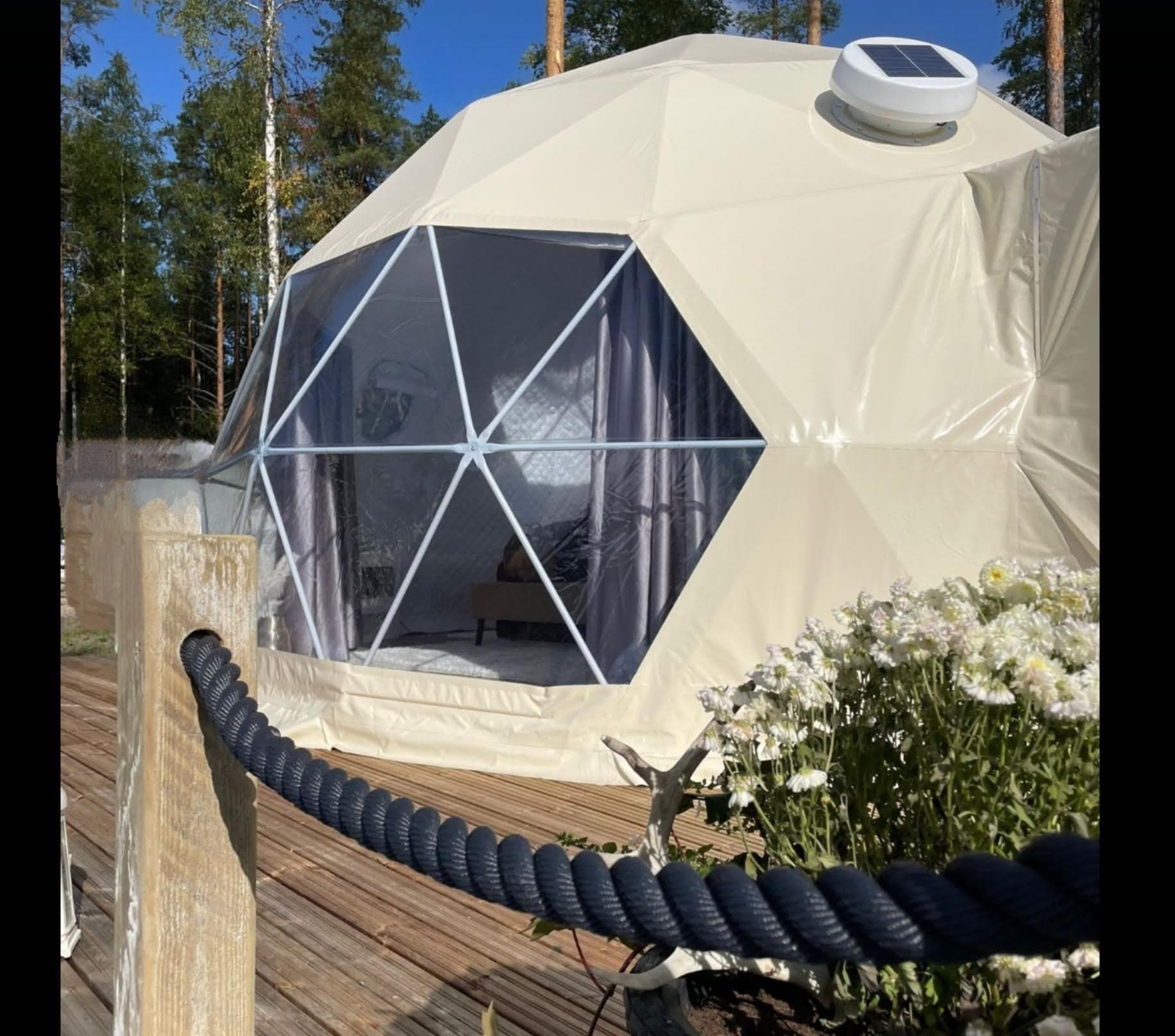 Geodesic dome with rope-railed deck at Watson's Lakefront Resort