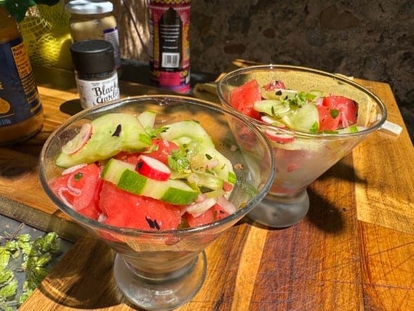 Watermelon-cucumber cocktail in a coupe glass with garden mint at Red's Tavern