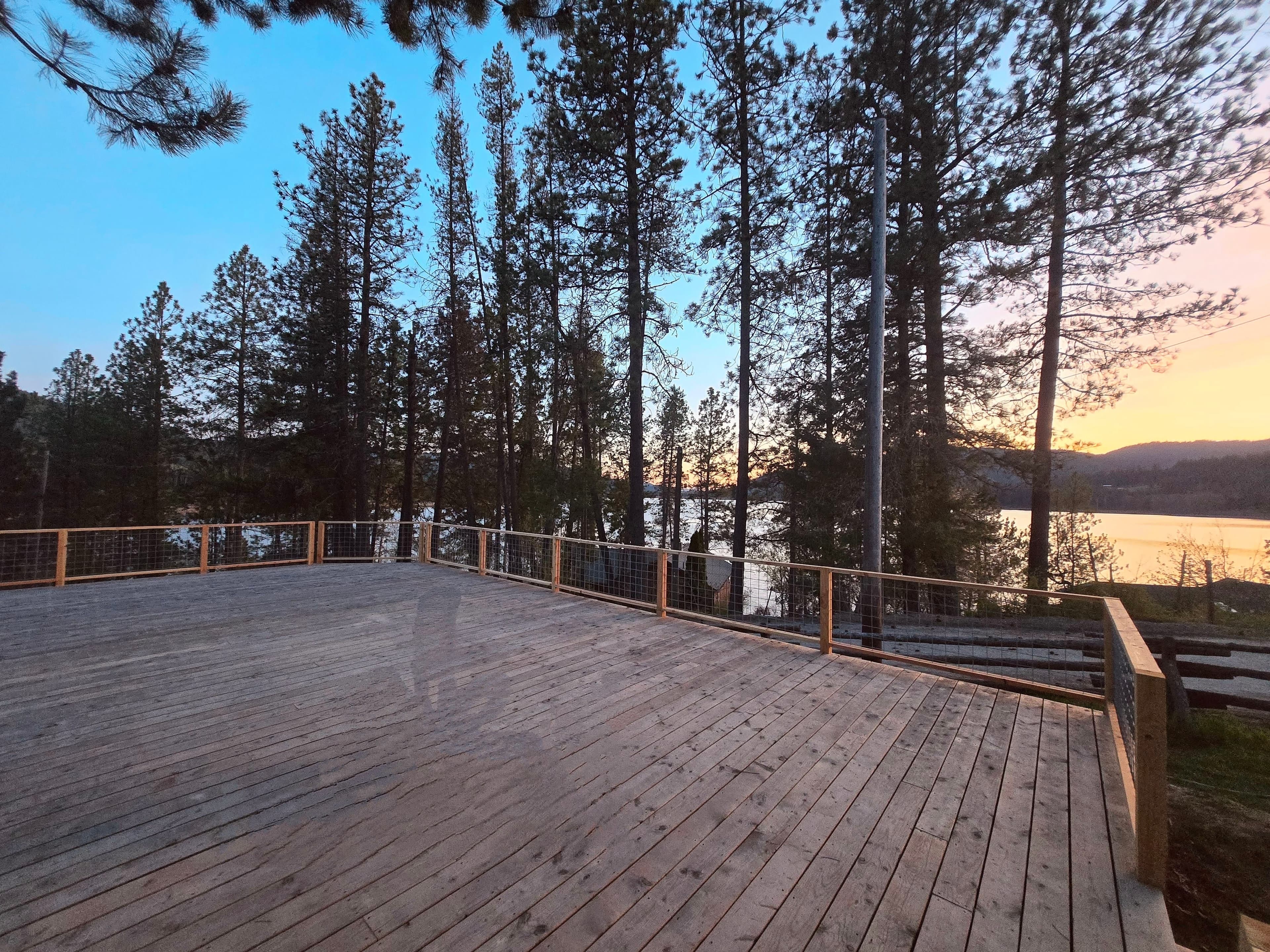 Sunset on the deck overlooking Rose Lake at Watson's Lakefront Resort