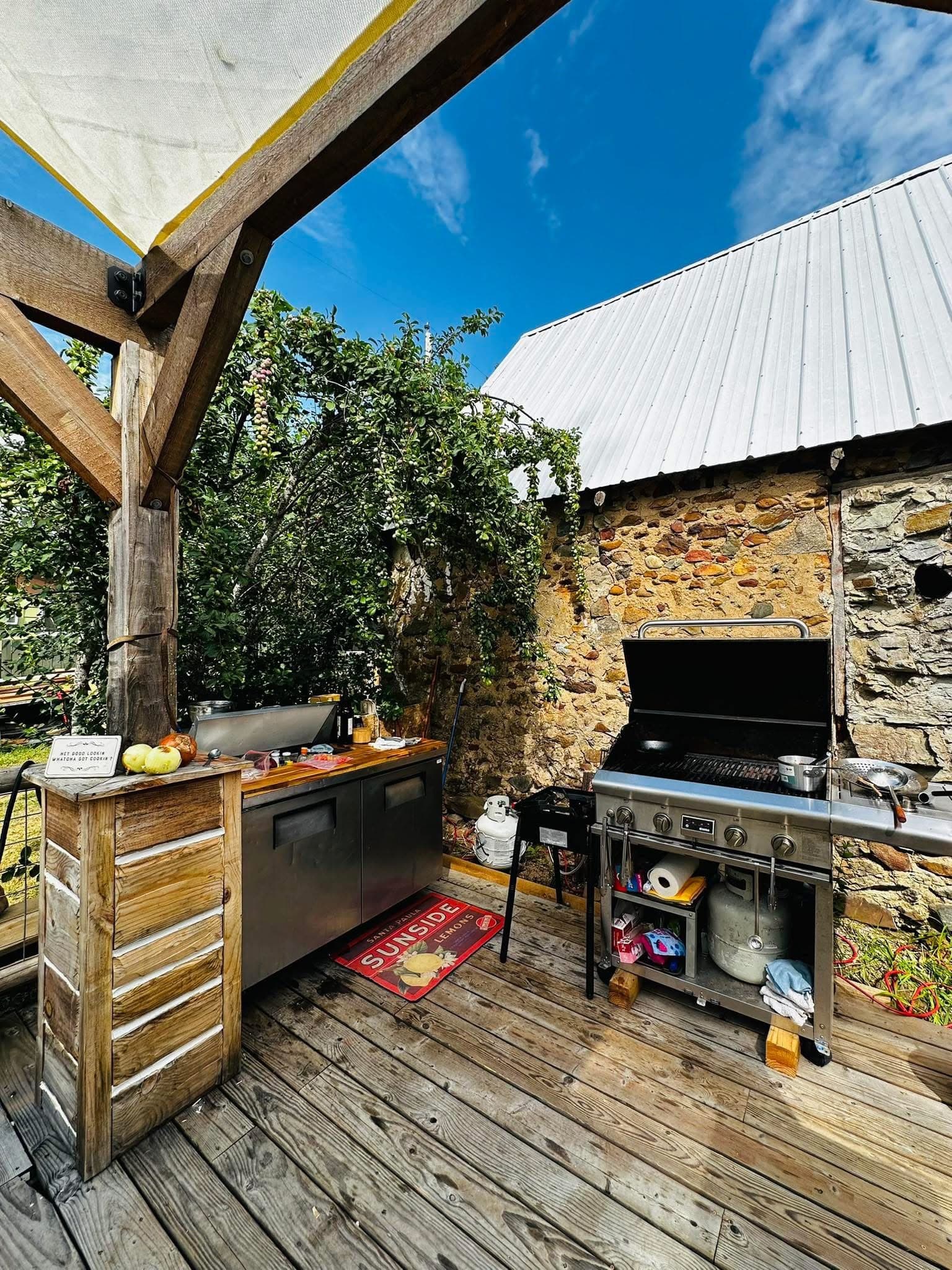 Outdoor kitchen and grill set up for a family cookout at Watson’s Lakefront Resort